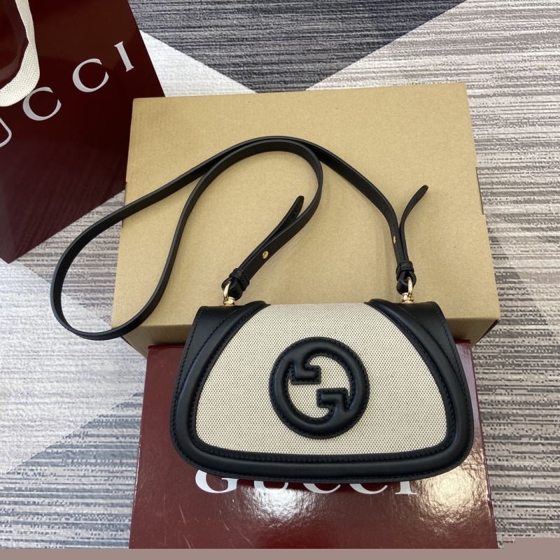 G*u*i satchel bags